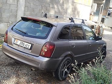 mazda cronos: Mazda 323: 2002 г., Механика, Бензин, Универсал — 3