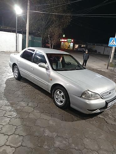 кубат: Kia Clarus: 2000 г., 2 л, Механика, Бензин, Седан — 4