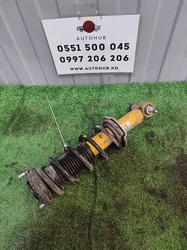 Передняя стойка в сборе Bilstein (желтый амортизатор) с пружиной и