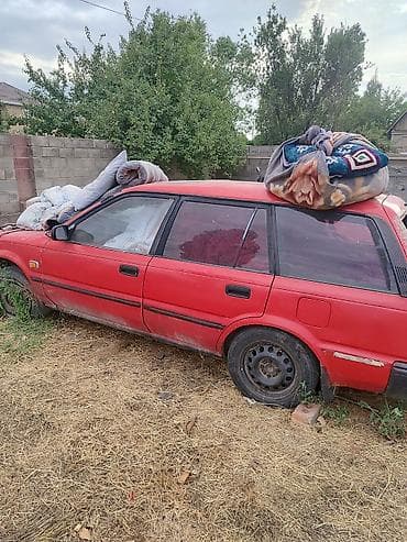 red cell: Toyota Corolla: 1987 г., Механика, Универсал — 4
