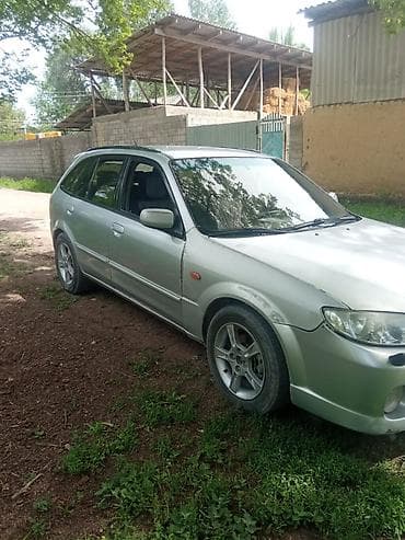 мазда миата: Mazda 323: 2003 г. — 1
