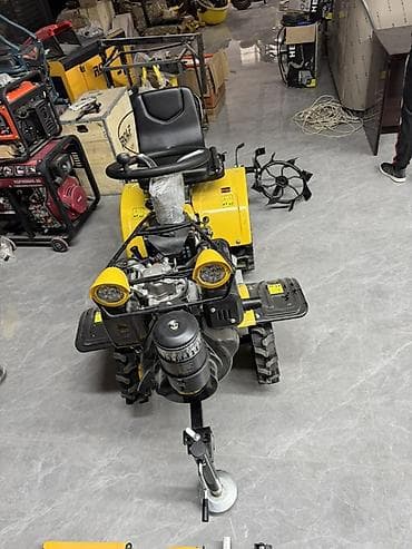 немецкий трактор: Мини-трактор (мотоблок с прицепным сиденьем) жёлтого цвета Описание — 4