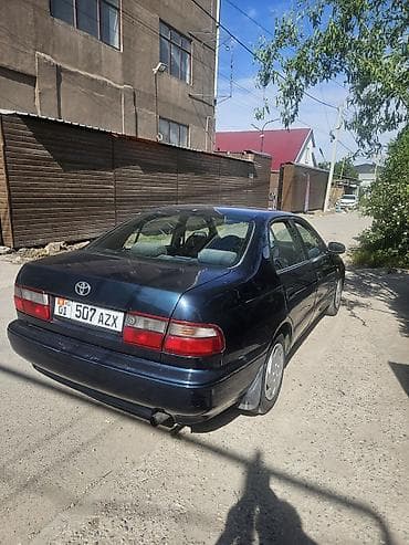 тико 2: Toyota Carina E: 1993 г., 2 л, Кол менен иштөөчү, Бензин, Седан — 3