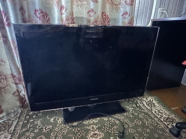 ps2 hdmi: Телевизор Samsung с плоским экраном на настольной подставке. - — 1