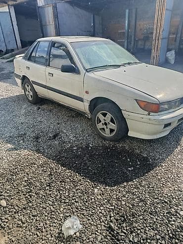 Транспорт: Mitsubishi Lancer: 1990 г., 1.5 л, Механика, Бензин, Седан — 2