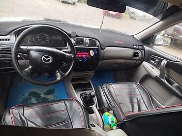 fit 2008: Mazda 323: 2002 г., 1.6 л, Ручные, Бензин, Хэтчбэк — 5