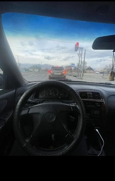 ex 6: Mazda Capella: 1998 г., 2 л, Механика, Универсал — 4
