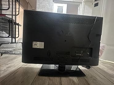 v tech: Телевизор LG, диагональ около 26–32". Плоская ЖК/LED‑панель — 1