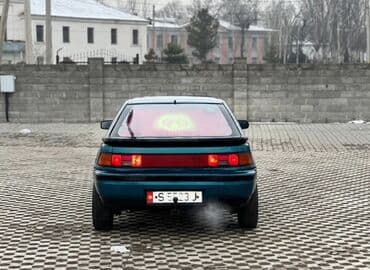 ваз 3107: Mazda 323: 1995 г., Хэтчбэк — 6