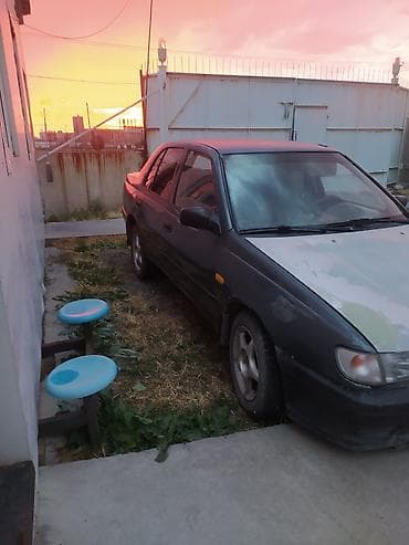 Транспорт: Nissan Sunny: 1991 г., 1.4 л, Механика, Бензин, Седан — 2