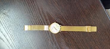 mi bend 6: Tissot T-Classic T143.210.33.021.00 — элегантные швейцарские наручные — 2