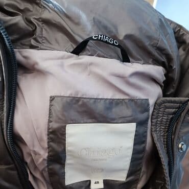 спортивное оборудование: Фирменный зимний пуховик 48-го размера. Состояние отличное — 4