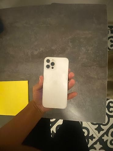 моби: IPhone 12 Pro, Б/у, 128 ГБ, Серебристый, Наушники, Зарядное устройство, Чехол — 2
