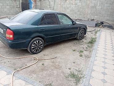 mazda d: Mazda 323: 2001 г., 1.6 л, Механика, Бензин, Седан — 6