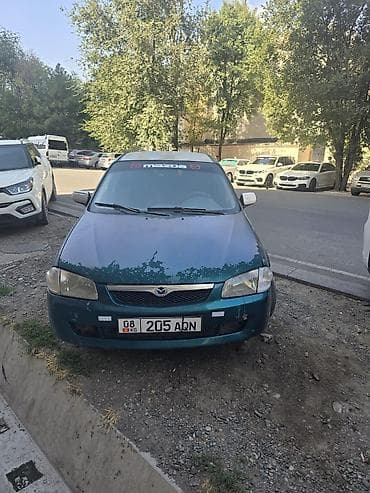мазда 122: Mazda 323: 1999 г., 1.6 л, Автомат, Бензин, Универсал — 1