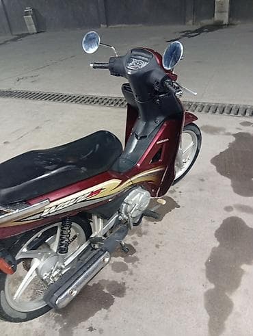 dio 27: Honda Wave — экономичный и практичный мопед (underbone) в бордовом — 4