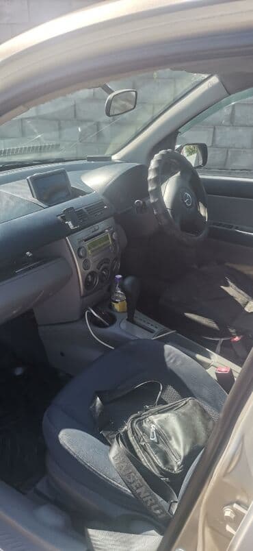 дом на кол: Mazda Demio: 2003 г., 1.3 л, Автомат, Бензин, Хэтчбэк — 7