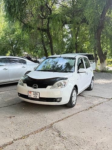айни 95: Mazda Demio: 2005 г., 1.5 л, Автомат, Бензин — 2