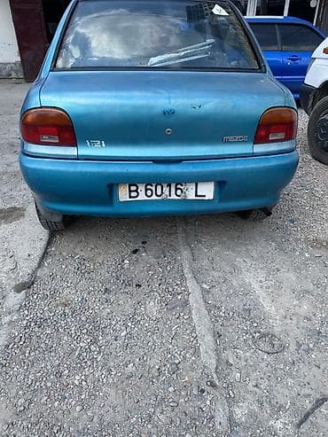Унаа сатуу: Mazda 121: 1991 г., Кол менен иштөөчү, Бензин, Седан — 4