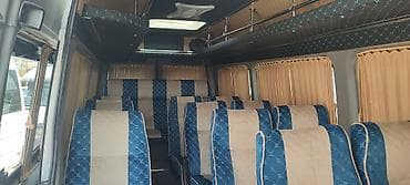 кунан жылкы: Буйрутмага жүргүнчүлөрдү ташуучу бус — 5