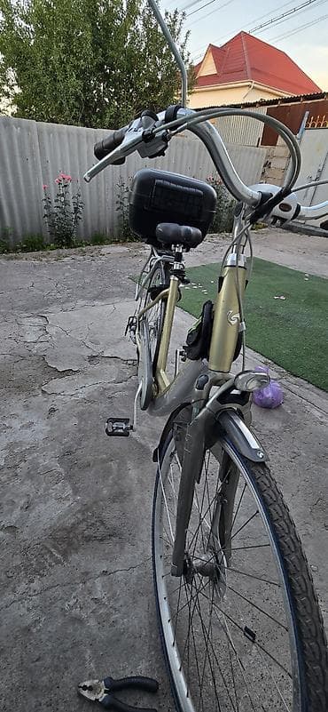 Городской велосипед Особенности и комплектация: - Классическая
