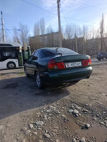 авто рага: Mitsubishi Carisma: 2000 г., 1.6 л, Кол менен иштөөчү, Бензин, Хетчбек — 9