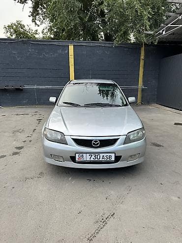 Mazda 323: 2004 г., Хэтчбэк