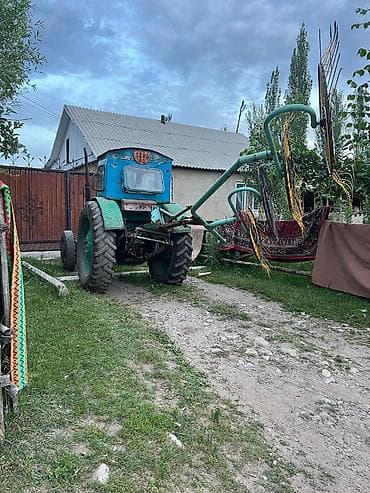 Унаа: Трактор колесный с навесным оборудованием (грабли-ворошилки) — 3