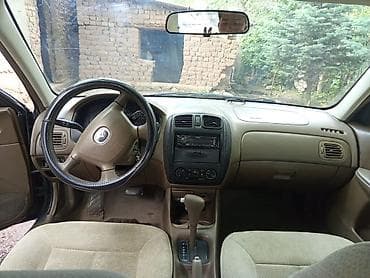 dodge ram 3.5: Mazda Familia: 2001 г., 1.5 л, Автомат, Бензин, Седан — 6