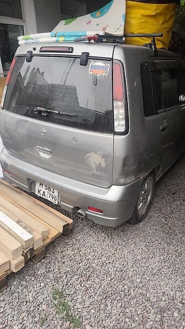 ice glok: Nissan Cube: 2000 г., Газ — 1