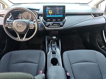 byd e5: Toyota Corolla: 2023 г., 1.8 л, Вариатор, Гибрид, Седан — 5