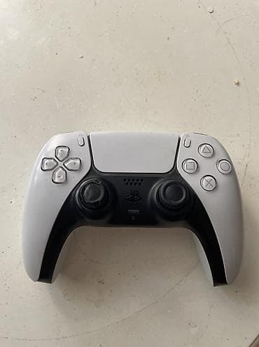 Б/у игровой контроллер Sony DualSense для PlayStation 5 (белый/чёрный) at lalafo.kg Б/у игровой контроллер Sony DualSense для PlayStation 5 (белый/чёрный)