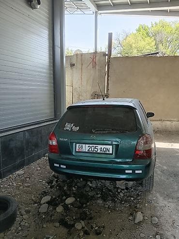 Mazda 323: 1999 г., Бензин, Хэтчбэк