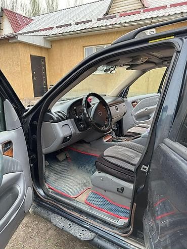 Mercedes-Benz ML-Class: 2003 г., 3.2 л, Автомат, Бензин, Кроссовер — 10