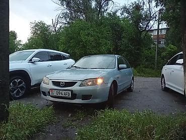 mazda demio 2004: Mazda 323: 2002 г., Механика, Хэтчбэк — 3