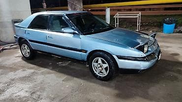 сг 9: Mazda 323: 1994 г., 1.6 л, Механика, Бензин, Лифтбек — 4