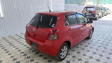 byd e7: Toyota Vitz: 2005 г., 0.1 л, Автомат, Бензин, Хэтчбэк — 5