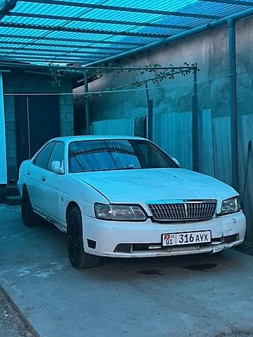 буфер спринтер: Nissan Laurel: 2000 г. — 3