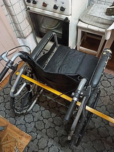 санитарный стул: Инвалидная коляска с санитарным вырезом и ведром (комба-туалет) — 4