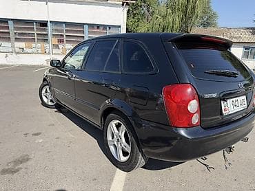 фуура даф: Mazda 323: 2002 г., 1.6 л, Механика, Бензин, Хэтчбэк — 3