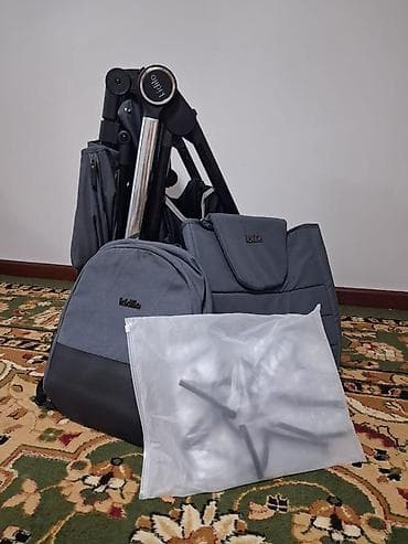 одежда спортивная: Детская коляска-прогулка Kidilo (серый цвет) - Универсальное сиденье — 7