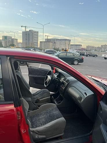 авто лейлек: Mazda 323: 1998 г., 1.5 л, Кол менен иштөөчү, Бензин, Универсал — 9