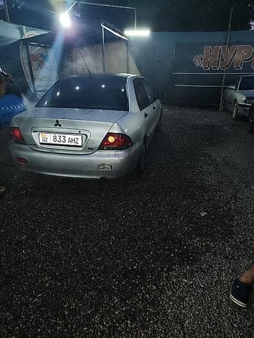 geely mongaro: Mitsubishi Lancer: 2005 г., Седан — 3