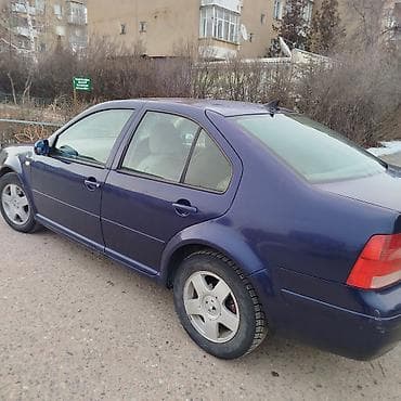 фары гольф2: Volkswagen Bora: 1999 г., Седан — 2