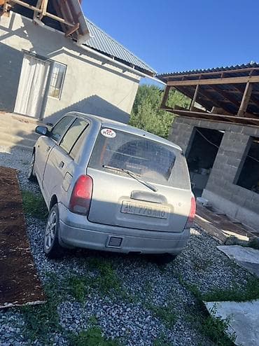 зеркало большие: Daihatsu Cuore: 2002 г., 1 л, Механика, Бензин, Хэтчбэк — 2