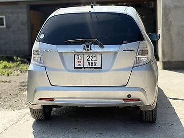 zimmer e9 pro: Honda Fit: 2011 г., 1.3 л, Вариатор, Гибрид, Хэтчбэк — 5