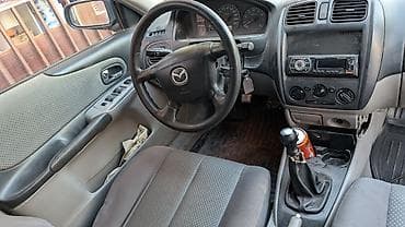 мазда 525: Mazda Familia: 2002 г., 1.6 л, Ручные, Бензин, Универсал — 2