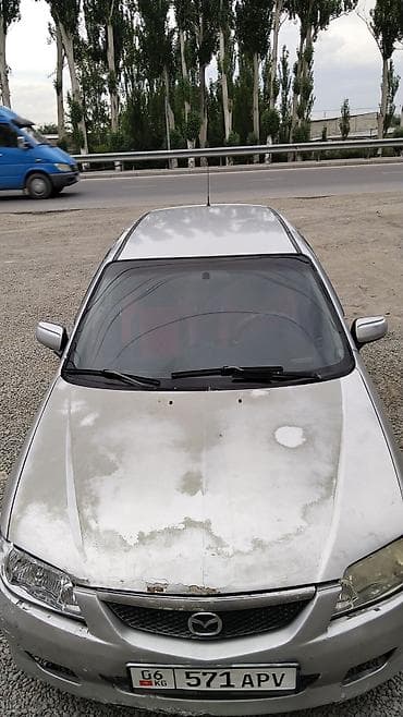 Mazda 323: 2002 г., 1.6 л, Автомат, Бензин, Универсал
