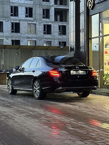 ipone 13 pro max: Mercedes-Benz E‑Class, черный седан бизнес-класса. Аренда авто От 3 — 2