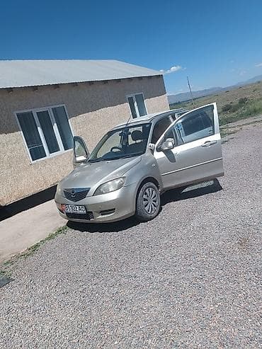 Транспорт: Mazda Demio: 2003 г., Бензин, Хэтчбэк — 1